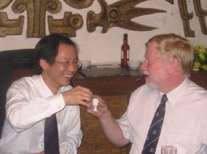 Peter toasts Tian Yihong.